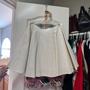 Pleaded faux leather skirt